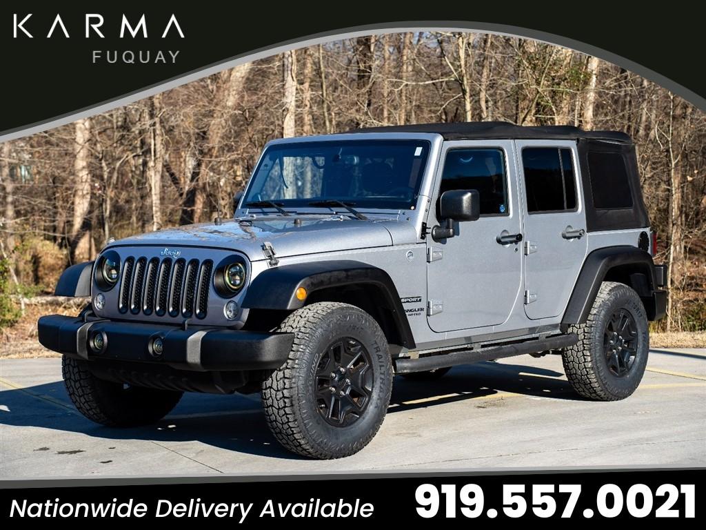 Used 2014 Jeep Wrangler Unlimited Sport with VIN 1C4BJWDG4EL145791 for sale in Fuquay-Varina, NC